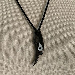 Eagle’s Head Pendant with Silk Cord